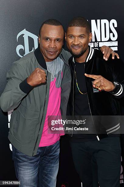 Boxer Sugar Ray Leonard and Singer Usher attend The Weinstein Company Presents the U.S. Premiere of "Hands of Stone" at SVA Theater on August 22,...