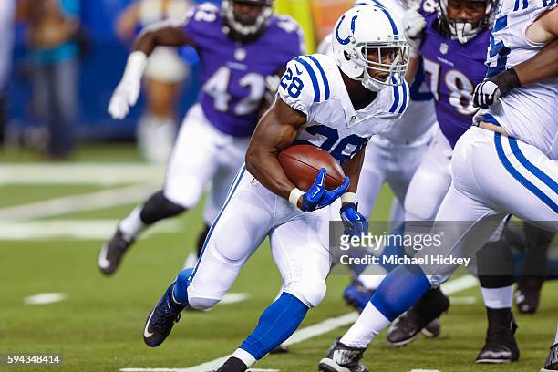 Jordan Todman of the Indianapolis Colts runs the ball against the Baltimore Ravens at Lucas Oil Stadium on August 20, 2016 in Indianapolis, Indiana.