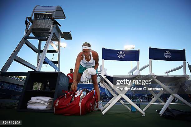 Petra Kvitova of the Czech Republic puts her bag down before her match against Louisa Chirio of the United States on day 2 of the Connecticut Open at...