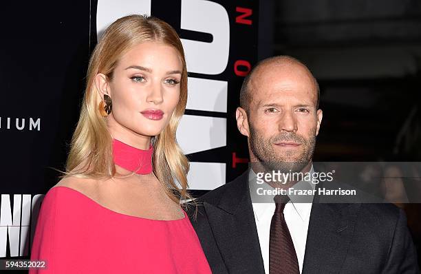 Actors Rosie Huntington-Whiteley and Jason Statham arrives at the Premiere of Summit Entertainment's "Mechanic: Resurrection" at ArcLight Hollywood...