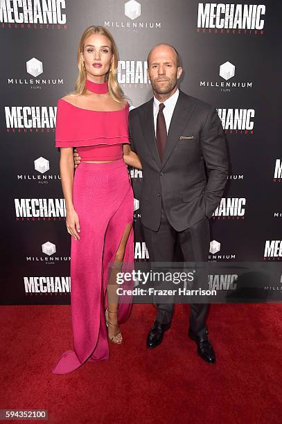 Actors Rosie Huntington-Whiteley and Jason Statham arrives at the Premiere of Summit Entertainment's "Mechanic: Resurrection" at ArcLight Hollywood...