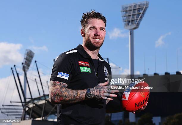 Retiring Dane Swan of the Magpies poses in front of the Melbourne Cricket Ground during a Collingwood Magpies AFL media session at the Holden Centre...