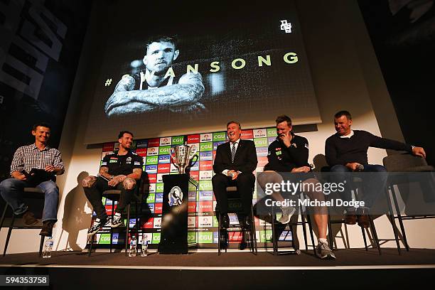 Retiring Dane Swan of the Magpies sits on a panel with Magpies President Eddie Maguire, head coach Nathan Buckley and his dad Billy Swan during a...