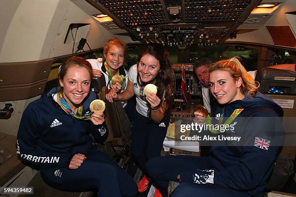 Giselle Ansley, Lilly Owsley, Laura Unsworth and Sophie Bray of Great Britain on the Team GB flight back from Rio on British Airways flight BA2016 on...