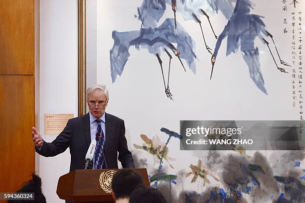 Philip Alston, UN Special Rapporteur on Extreme Poverty and Human Rights, delivers his speech during a press conference in Beijing on August 23,...