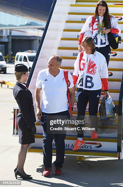 Sir Steve Redgrave and fellow rower and silver medallist Katherine Grainger arrive home at Heathrow Airport on August 23, 2016 in London, England....