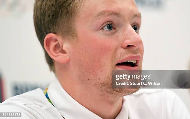 Gold medalist Adam Peaty speaks to journalists during the Team GB press conference at the Sofitel, Heathrow Airport on August 23, 2016 in London,...