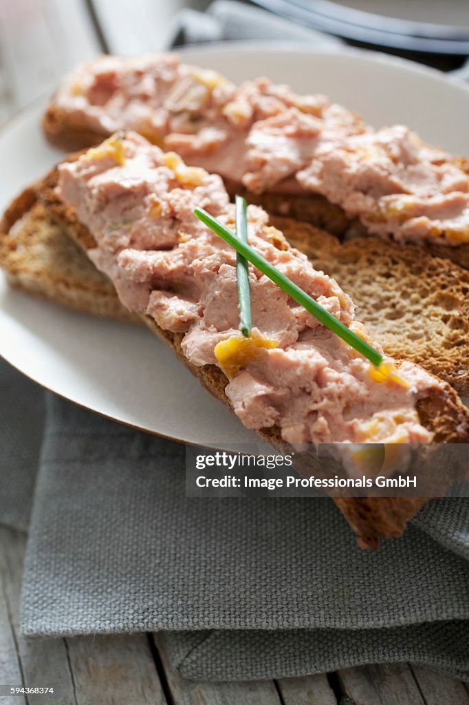 Crostini topped with chicken liver pâté