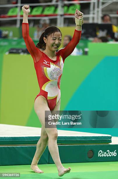 Asuka Teramoto of Japan celebrates after competing in the vault of during the Artistic Gymnastics Women's Team Final on Day 4 of the Rio 2016 Olympic...