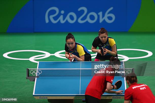 Ai Fukuhara and Mima Ito of Japan play against Austria during the Table Tennis Women's Team Round Quarter Final between Japan and Austria during the...