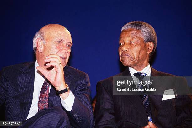 Nelson Mandela and President F. W. De Klerk at peace signing ceremony during pre-election violence. Former President of South Africa and longtime...