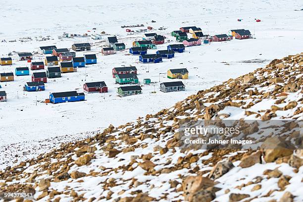 village at remote polar landscape - qaanaaq stock pictures, royalty-free photos & images