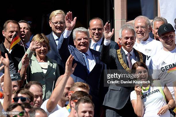 German President Joachim Gauck with his wife Daniela Schadt and the Mayor of Frankfurt Peter Feldmann welcome the Athletes during the German Olympic...