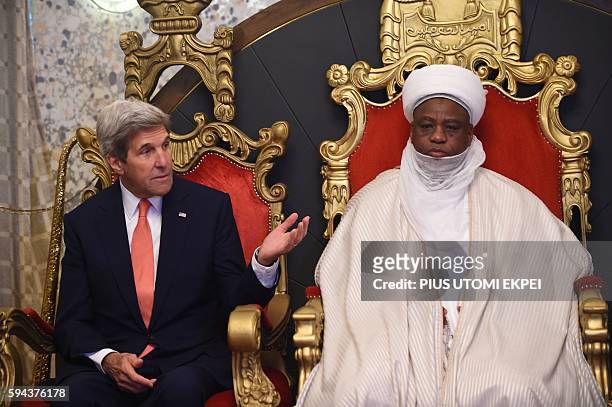 United States Secretary of State John Kerry talks with the Sultan of Sokoto and President-General of the Nigerian National Supreme Council for...