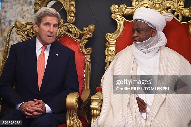 United States Secretary of State John Kerry talks with the Sultan of Sokoto and President-General of the Nigerian National Supreme Council for...