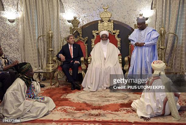 Secretary of State John Kerry sits next to Sokoto Sultan and President-General of the Nigerian National Supreme Council for Islamic Affairs Muhammad...