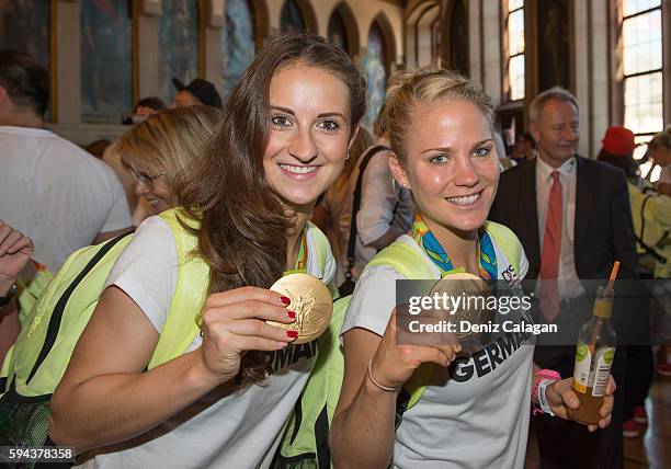 Sara Daebritz and Leonie Maier pose with their gold medals on August 23, 2016 in Frankfurt am MaIN, GERMANY.