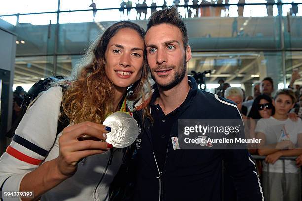 Elodie Clouvel, individual modern pentathlon silver medalist, arrives at Roissy Charles de Gaulle airport after the Olympic Games in Rio on August...