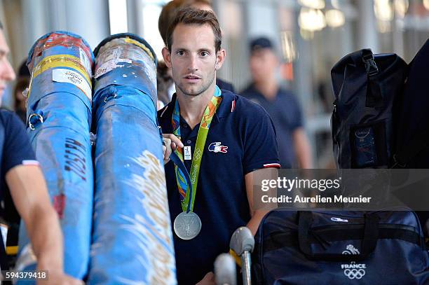 Renaud Lavillenie, pole vault silver medalist, arrives at Roissy Charles de Gaulle airport after the Olympic Games in Rio on August 23, 2016 in...