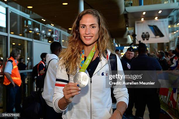 Elodie Clouvel, individual modern pentathlon silver medalist, arrives at Roissy Charles de Gaulle airport after the Olympic Games in Rio on August...