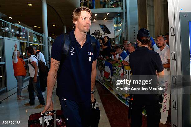 Camille Lacourt arrives at Roissy Charles de Gaulle airport after the Olympic Games in Rio on August 23, 2016 in Paris, France. Team France finished...