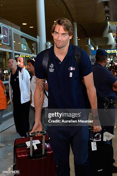 Camille Lacourt arrives at Roissy Charles de Gaulle airport after the Olympic Games in Rio on August 23, 2016 in Paris, France. Team France finished...