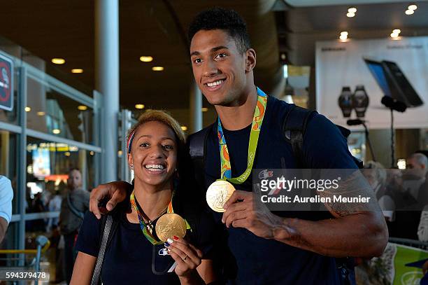 Estelle Mossely, light 60kg boxing Gold medalist and Tony Yoka, super heavy over 91kg gold medalist, arrive at Roissy Charles de Gaulle airport after...