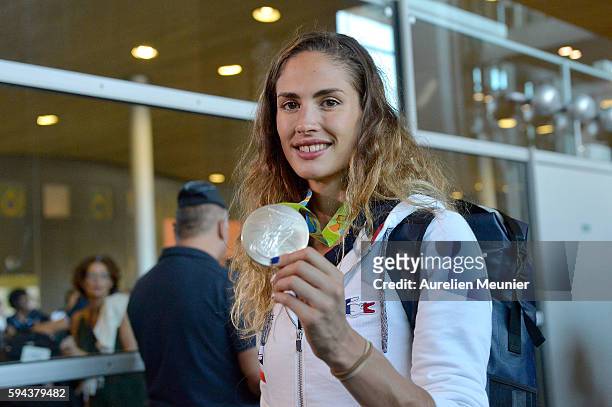 Elodie Clouvel, individual modern pentathlon silver medalist, arrives at Roissy Charles de Gaulle airport after the Olympic Games in Rio on August...