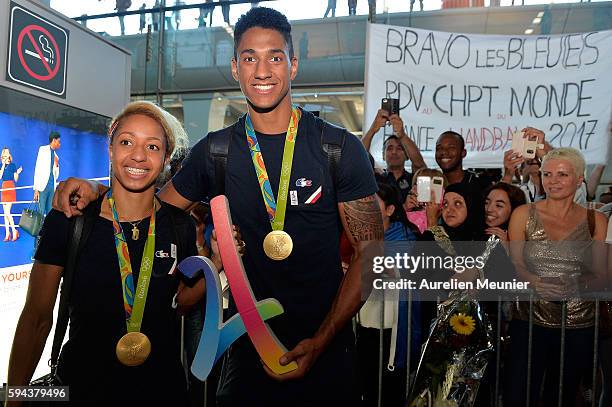 Estelle Mossely, light 60kg boxing Gold medalist and Tony Yoka, super heavy over 91kg gold medalist, arrive at Roissy Charles de Gaulle airport after...