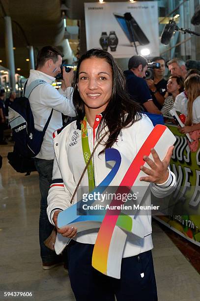 Sarah Ourahmoune, boxing Silver medalist arrives at Roissy Charles de Gaulle airport after the Olympic Games in Rio on August 23, 2016 in Paris,...