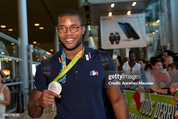 Mehdy Metella, swimming Silver medalist arrives at Roissy Charles de Gaulle airport after the Olympic Games in Rio on August 23, 2016 in Paris,...