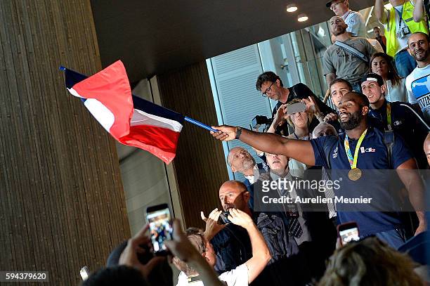 Teddy Riner, judo Gold medalist arrives at Roissy Charles de Gaulle airport after the Olympic Games in Rio on August 23, 2016 in Paris, France. Team...