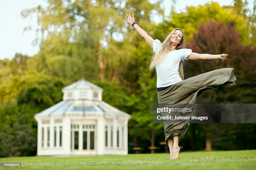 Happy woman in park