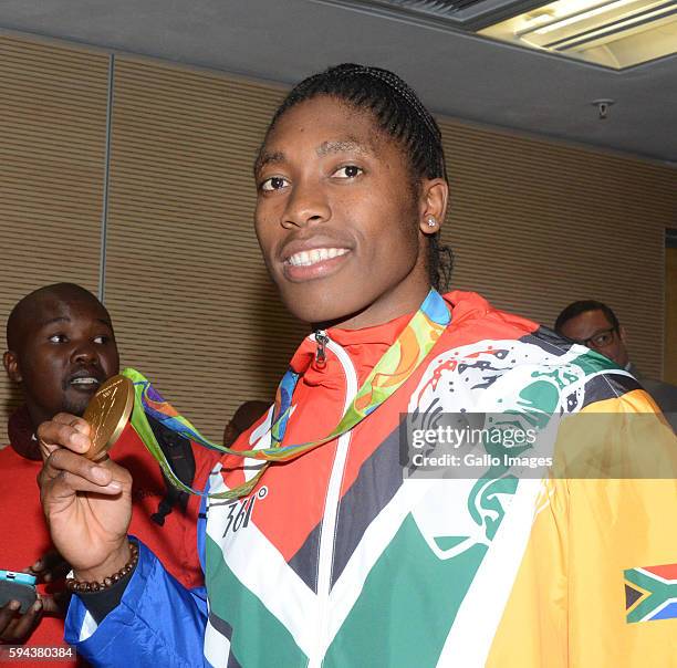 Gold medallist Caster Semenya at the OR Tambo airport during the arrival of the SA Athletics team from the 2016 Rio Olympics on August 23, 2016 in...