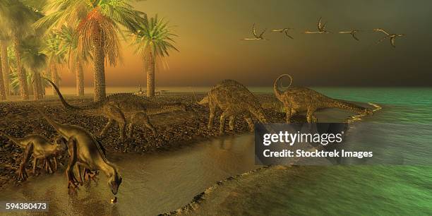 uberabatitan dinosaurs share a cretaceous seashore with two hypsilophodon. - quetzalcoatlus stock-grafiken, -clipart, -cartoons und -symbole
