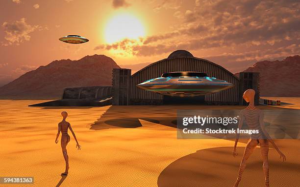 alien reptoids and their flying saucers at area 51, a top secret base in nevada, usa. - nevada desert stock illustrations