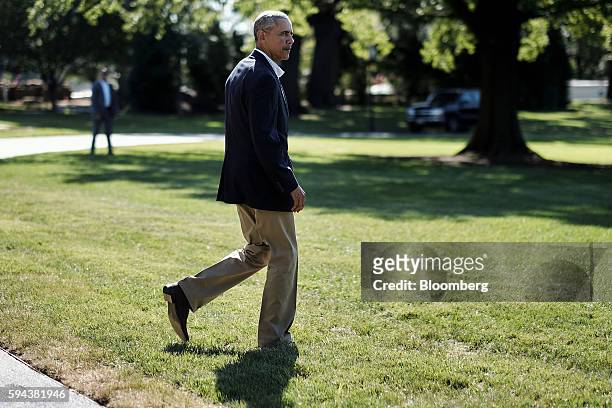 President Barack Obama walks to Marine One on the South Lawn as he departs from the White House in Washington, D.C. On Tuesday, Aug. 23, 2016. Obama...