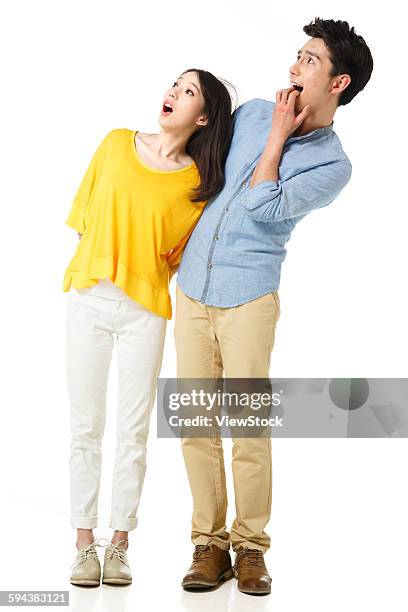 portrait of young man and young woman - chinese man looking up bildbanksfoton och bilder