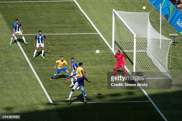 Summer Olympics: Brazil Luan Garcia in action vs Honduras goalie Luis Lopez during Men's Semifinal at Maracana Stadium. Rio de Janeiro, Brazil...