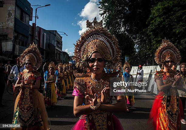 Some participants carnival Yogyakarta Art Festival walk in Malioboro, Yogyakarta, Indonesia, on August 23, 2016. This event has been going on for 28...