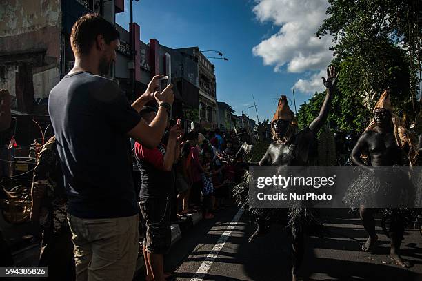 Some participants carnival Yogyakarta Art Festival walk in Malioboro, Yogyakarta, Indonesia, on August 23, 2016. This event has been going on for 28...