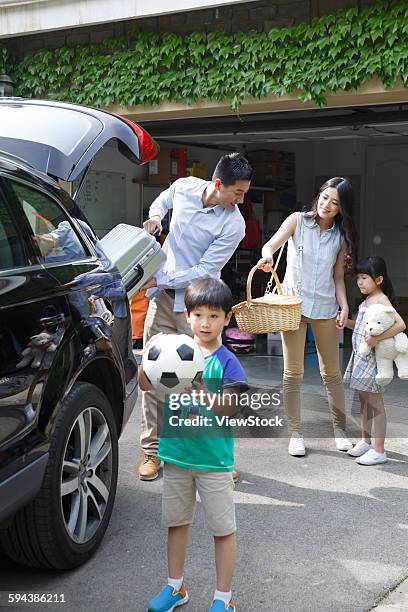 happy family car travel - asian couple garage car stock pictures, royalty-free photos & images