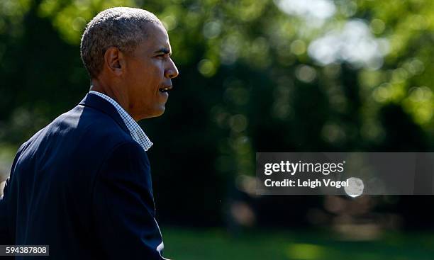 President Barack Obama walks toward Marine One on his way to Baton Rouge, Louisiana on August 23, 2016 in Washington, DC.