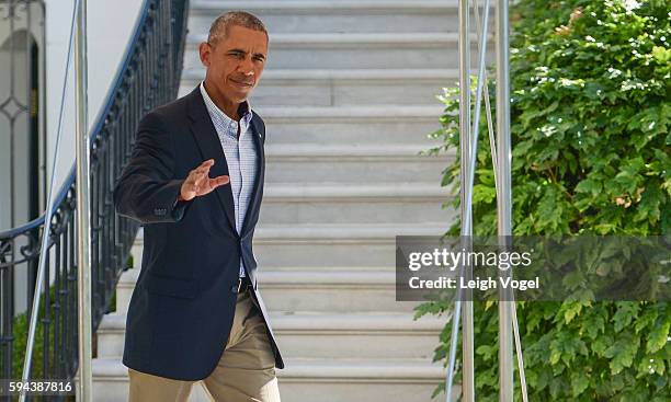 President Barack Obama walks toward Marine One on his way to Baton Rouge, Louisiana on August 23, 2016 in Washington, DC.