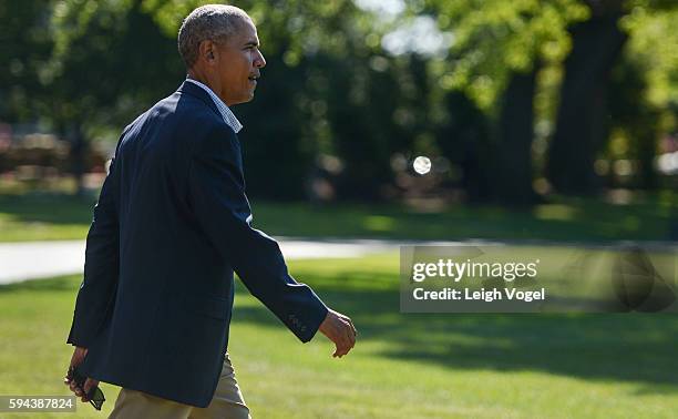 President Barack Obama walks toward Marine One on his way to Baton Rouge, Louisiana on August 23, 2016 in Washington, DC.