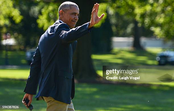 President Barack Obama walks toward Marine One on his way to Baton Rouge, Louisiana on August 23, 2016 in Washington, DC.