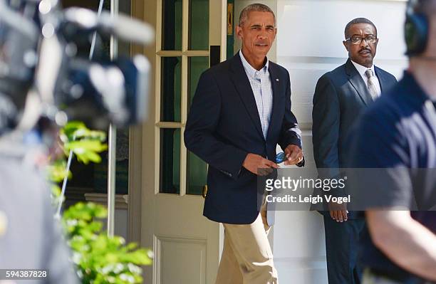 President Barack Obama walks toward Marine One on his way to Baton Rouge, Louisiana on August 23, 2016 in Washington, DC.