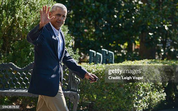 President Barack Obama walks toward Marine One on his way to Baton Rouge, Louisiana on August 23, 2016 in Washington, DC.