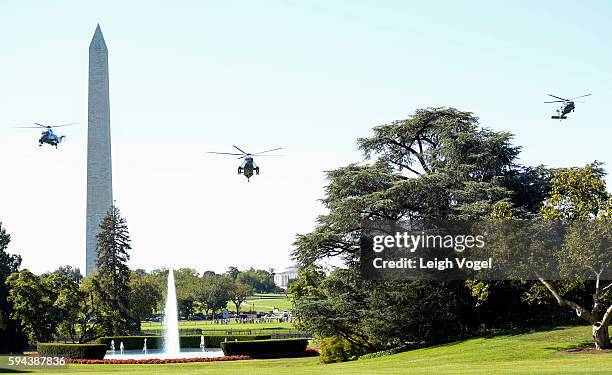 President Barack Obama travels on Marine One on his way to Baton Rouge, Louisiana on August 23, 2016 in Washington, DC.