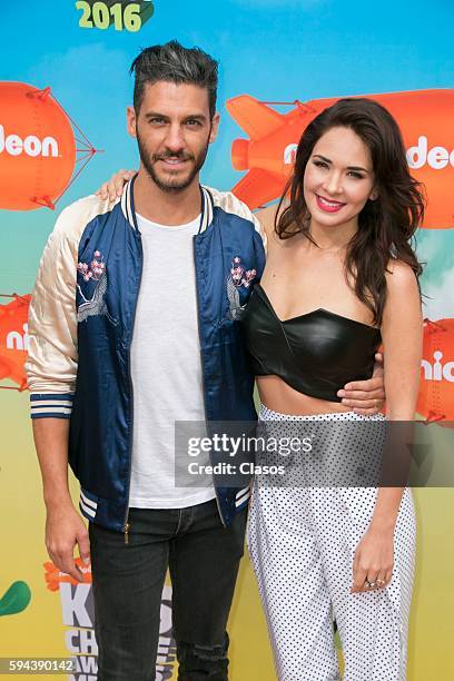 Erik Elias and Adriana Louvier poses for pictures during the Kids Choice Awards Mexico 2016 Red Carpet at Auditorio Nacional on August 20, 206 in...